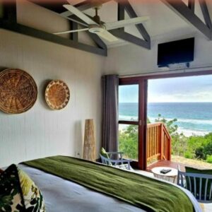 Спальня с собственной террасой и видом на море в Casa Cara, Ponta Malongane, Мозамбик