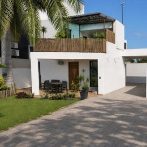 Фасад и сад Casa Mangrove, Мапуту