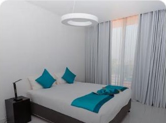 莫桑比克马普托Golf View Apartments一居室公寓的卧室