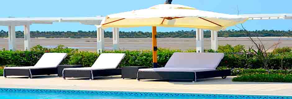 The pool terrace at Hotel Casa do Capitão overlooking Inhambane Bay