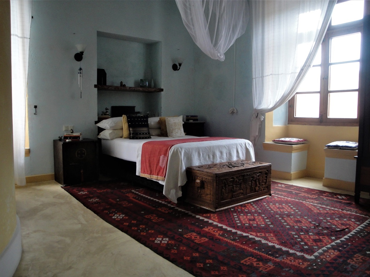 Jardim dos Aloes, Ilha de Mocambique — the Aloe Vera Relaxing Apartment bedroom, photograph from the property's official website