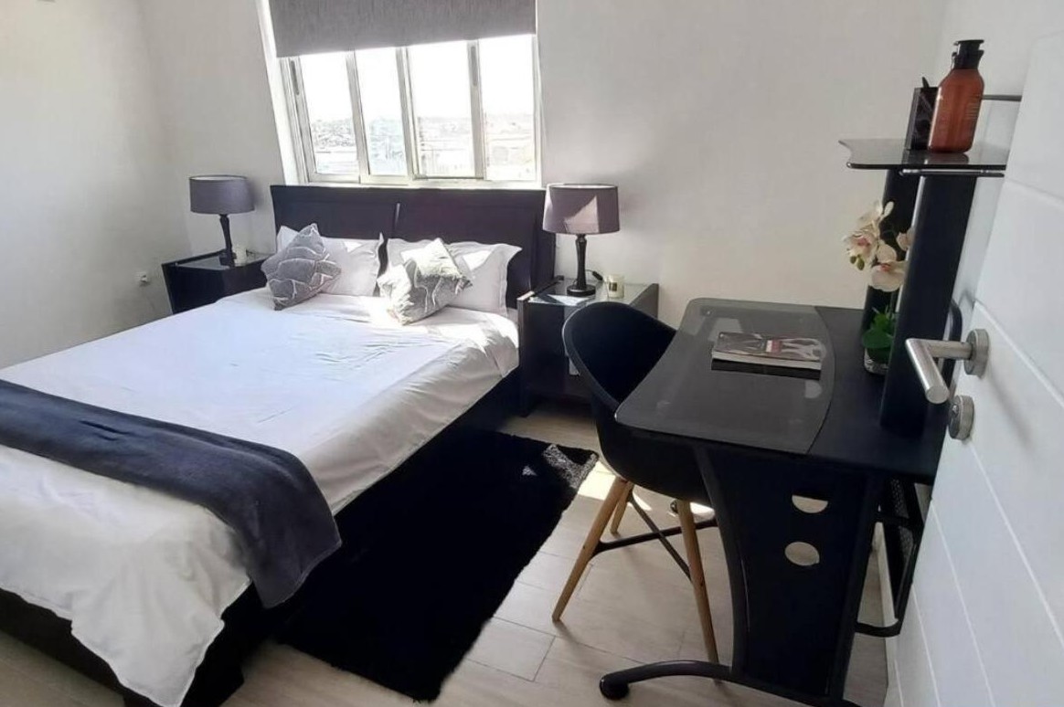 Camera da letto presso Sweet Home, Maputo