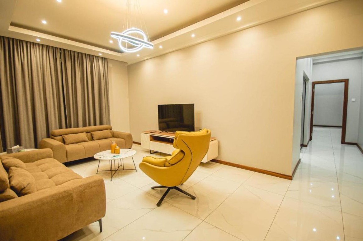 Salon d'un appartement à Ultra Aparthotel, Tete